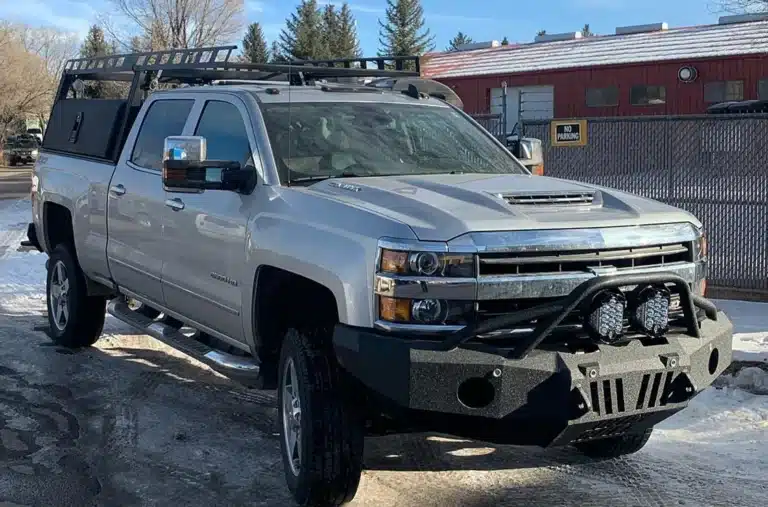 Light-Duty Diesel Truck Repair in Carbondale, CO by JW Diesel & Automotive. An image of a silver truck parked in a parking lot.